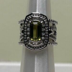 August birthday Peridot on Rhodium (silver) ring.  Size 5